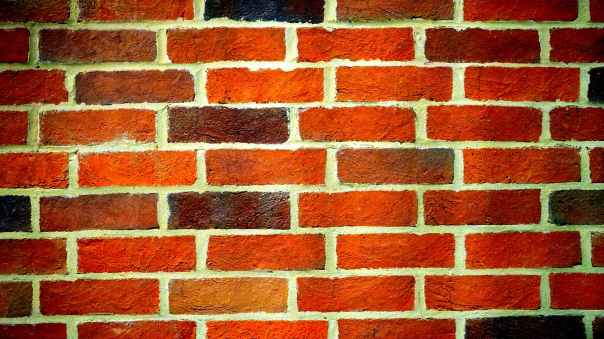 landscape photography of orange brick wall